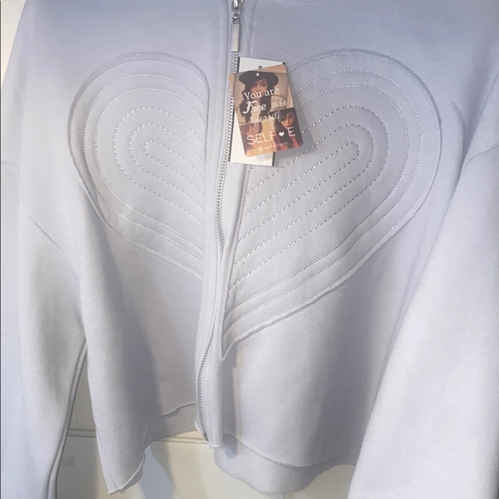 Brand new with tags hoodie Jacket size Medium by Self Esteem. Super Soft Inside